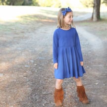 Step-by-step tutorial to make this darling knit twirl dress by altering a basic dress pattern.