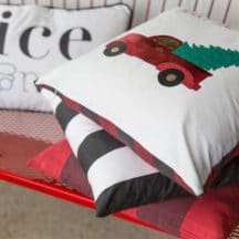 Create these festive and beautiful Christmas pillows with custom iron-on designs.