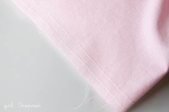 pink fabric with stitches
