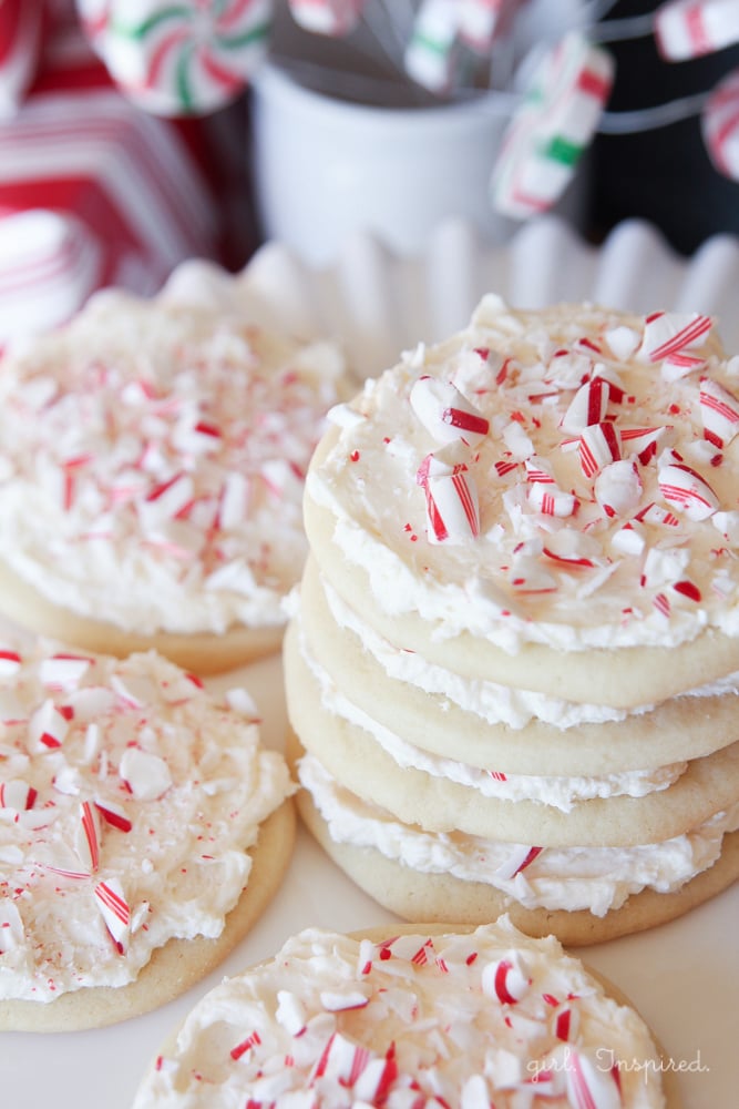 Cut-Out Sugar Cookies topped with Peppermint Marshmallow Frosting and Candy Cane bits!