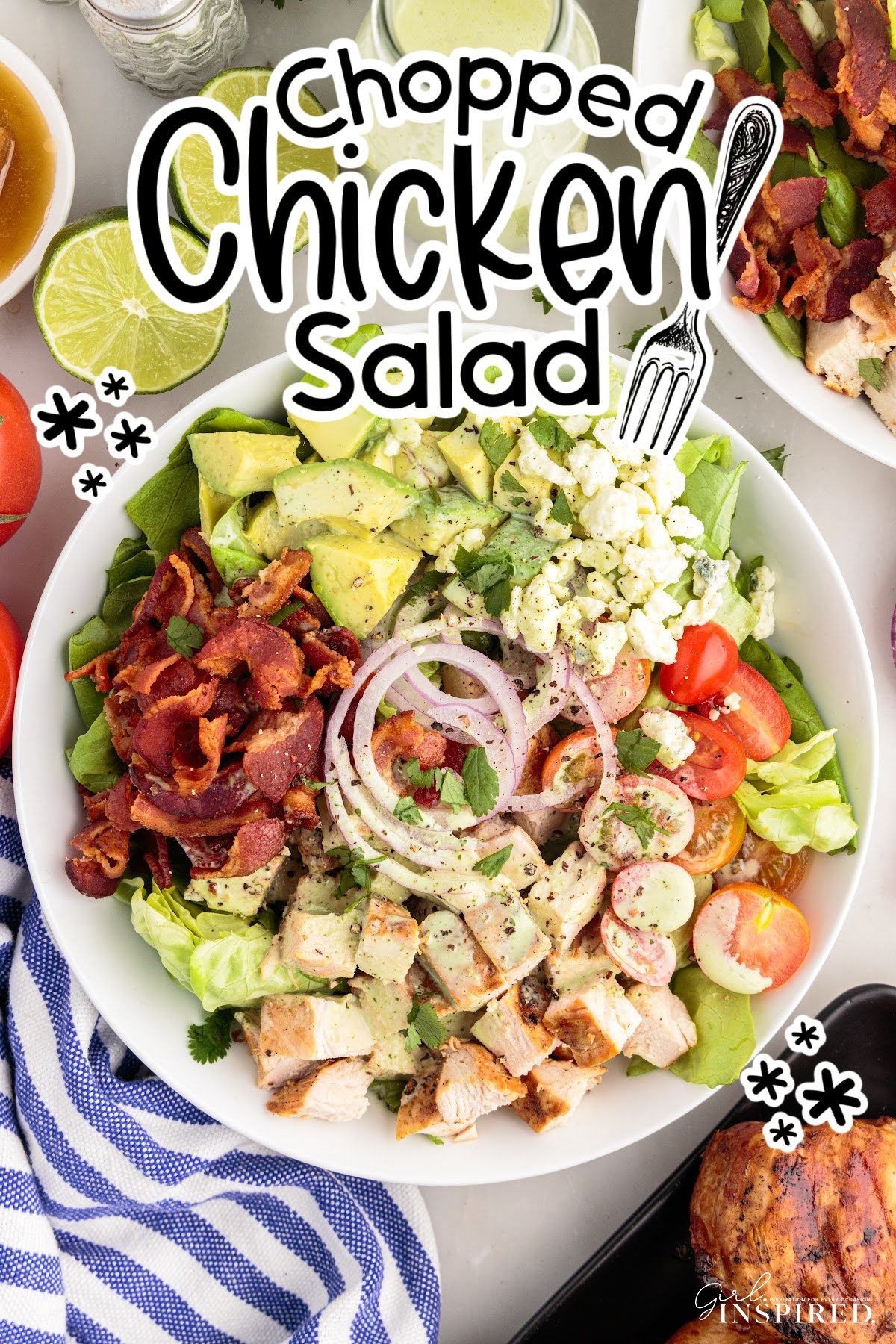 Chopped chicken salad with bacon, avocado, onions, tomatoes, and blue cheese tossed in dressing.