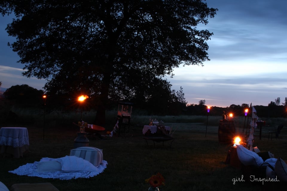 Tiki Torches glow at Outdoor Movie Night