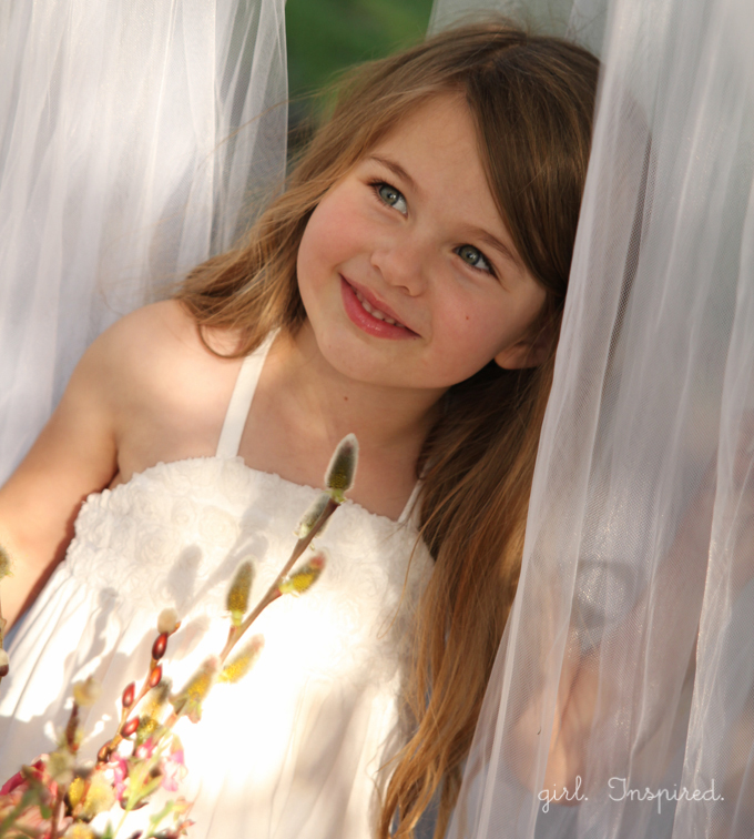 Hanging Tulle Tent - great for entertaining little guests or creating a fun focal spot in the yard