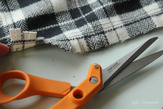 Make a cozy Flannel Fringe Blanket - so simple, you could even make this no-sew!