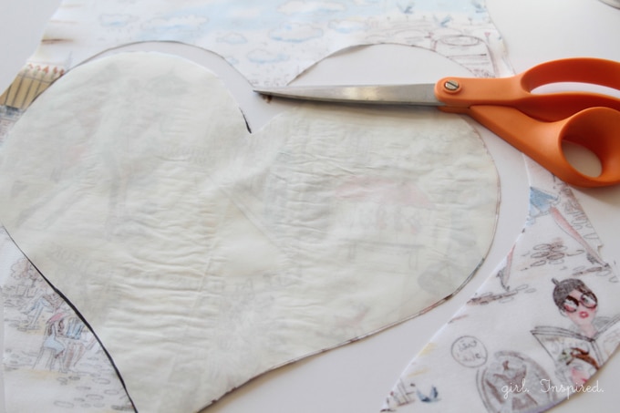 Learn simple applique techniques to make this cute heart pillow!