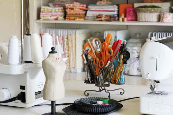 Sewing Room Tour - ideas for storing fabric, tools, a large workspace and desk - and lots of little decorative details!