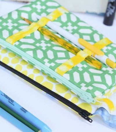 Pencil Pouch Sewing Tutorial - a cool twist on the classic zip pencil pouch with accessible pen storage on the outside!