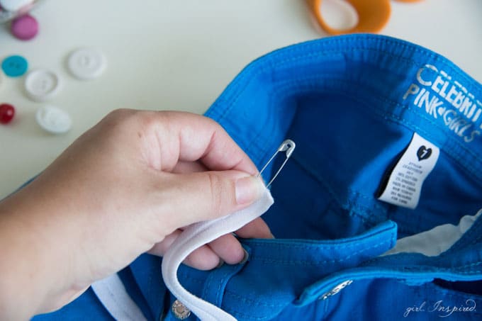 Add an adjustable elastic waistband to kids' clothes in a snap. No sewing machine necessary! It's so simple to turn unusable shorts/pants into a perfectly fitting pair!