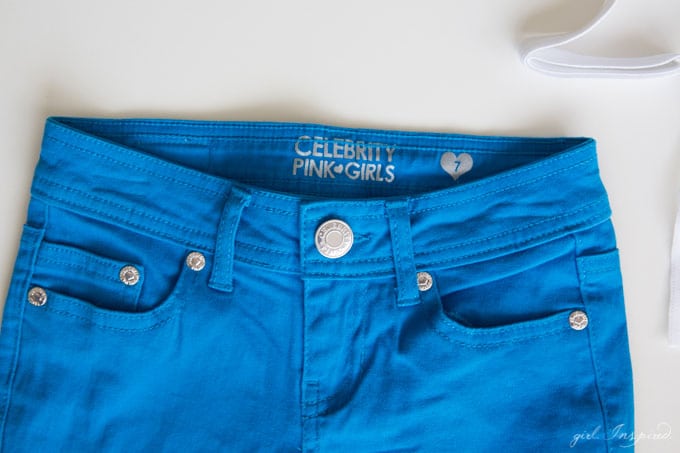 Add an adjustable elastic waistband to kids' clothes in a snap. No sewing machine necessary! It's so simple to turn unusable shorts/pants into a perfectly fitting pair!
