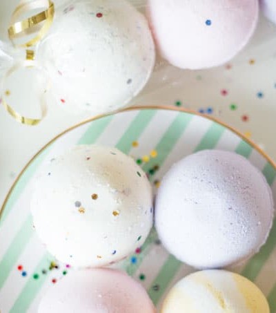 Make surprise DIY bath bombs even more awesome by adding confetti and/or small toys for the most awesome kid's bath experience!