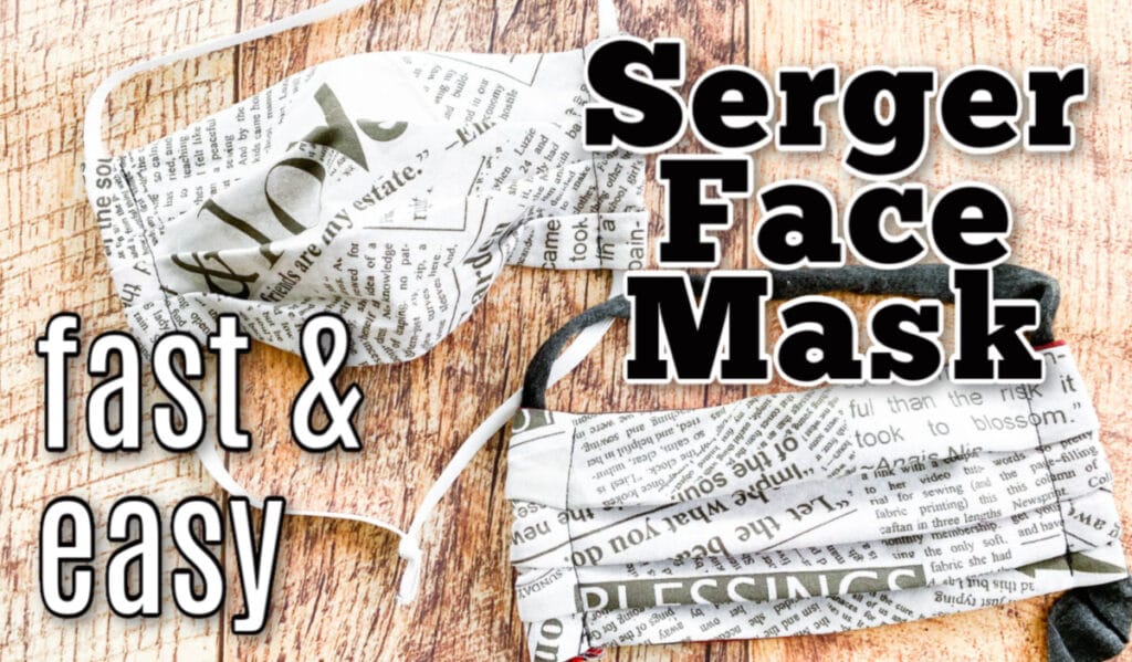 finished serged newsprint fabric mask on wood plank background with text overlay