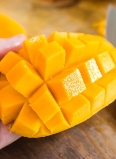 half of a mango inverted so that chunks are popped outward