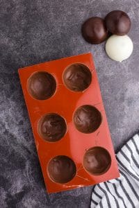 hardened chocolate in sphere molds
