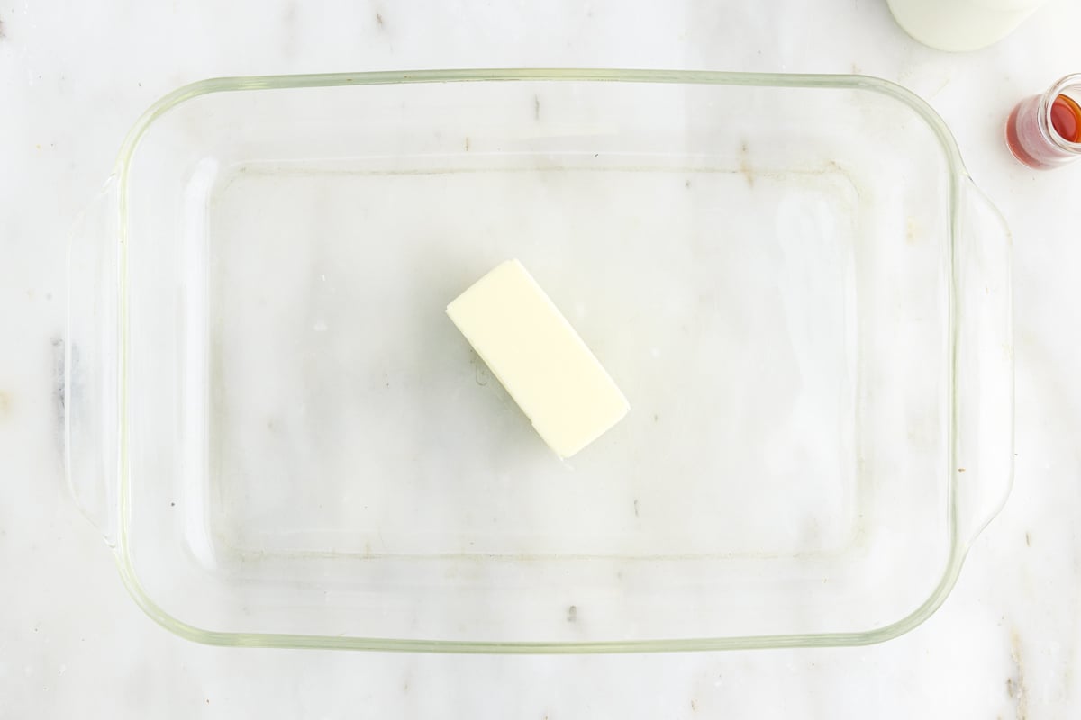 Stick of butter in glass baking dish.