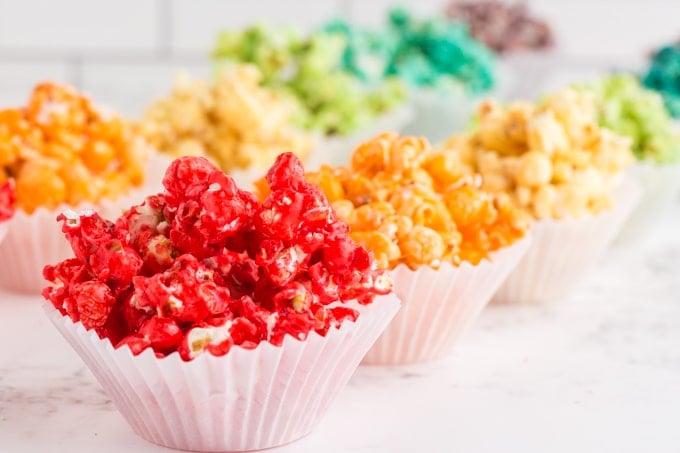 cupcake liners with rainbow colored popcorn