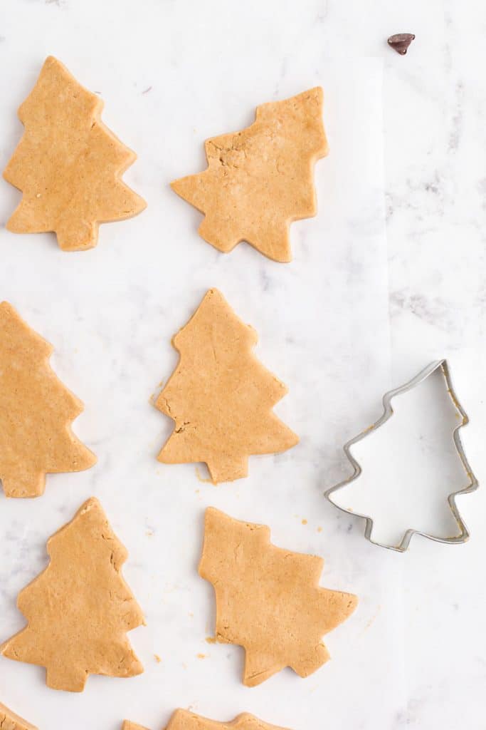 peanut butter tree-shaped cutouts and metal cookie cutter