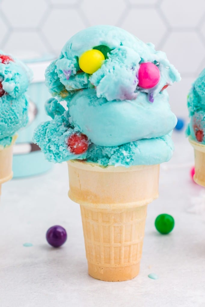 ice cream cone loaded with blue bubblegum ice cream