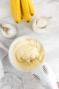 smooth and creamy pudding mixture in white mixing bowl