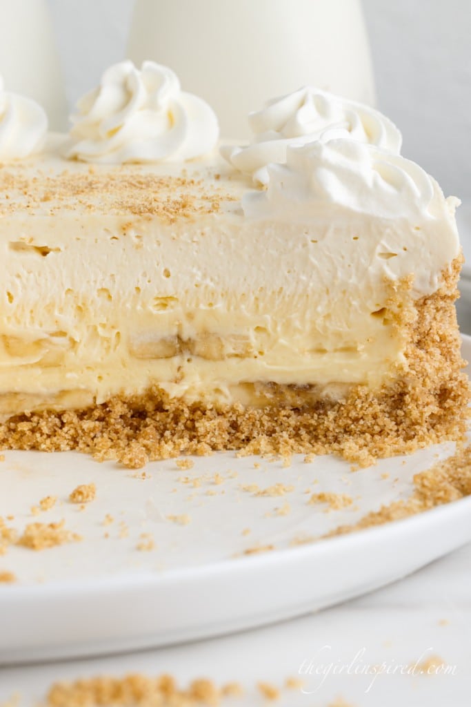a close up of the different layers in a slice of banana cheesecake