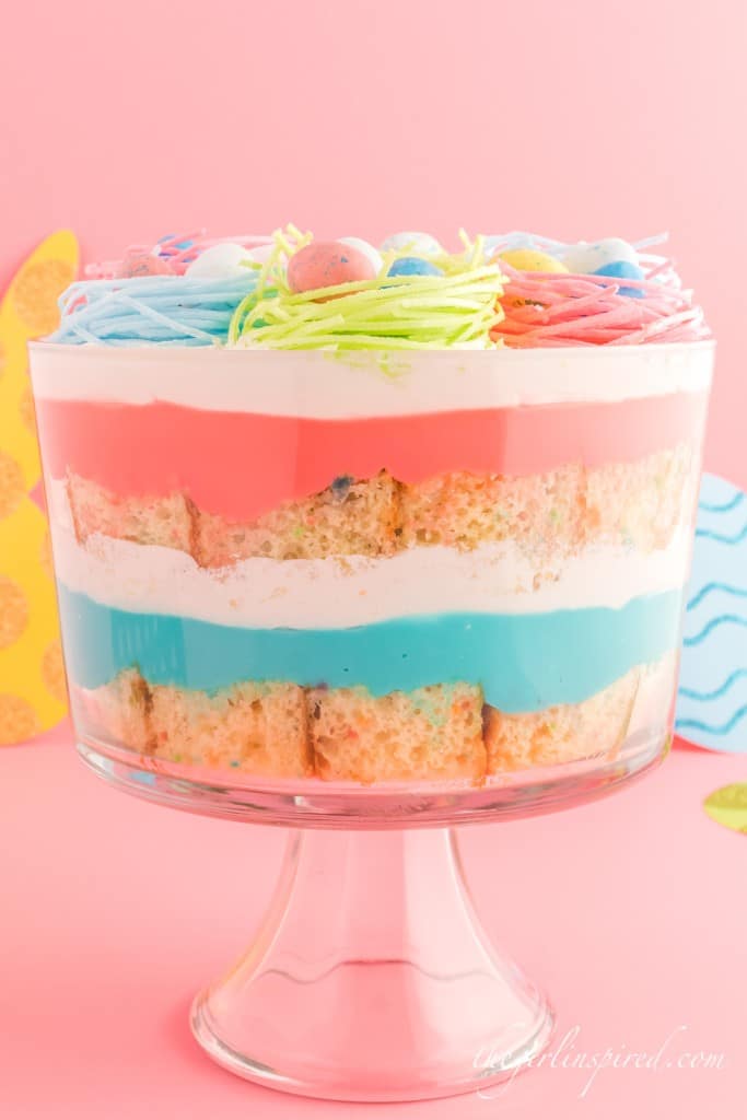 easter dessert trifle topped with colorful bird nests and candy