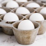 hard boiled eggs in a 12-cup muffin tin