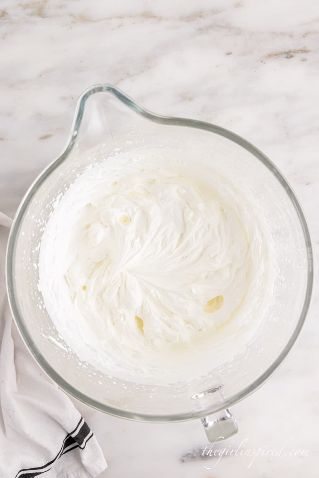 whipped cream in standing mixer bowl.