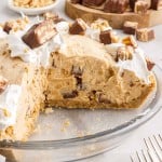 snickers pie with slice taken out