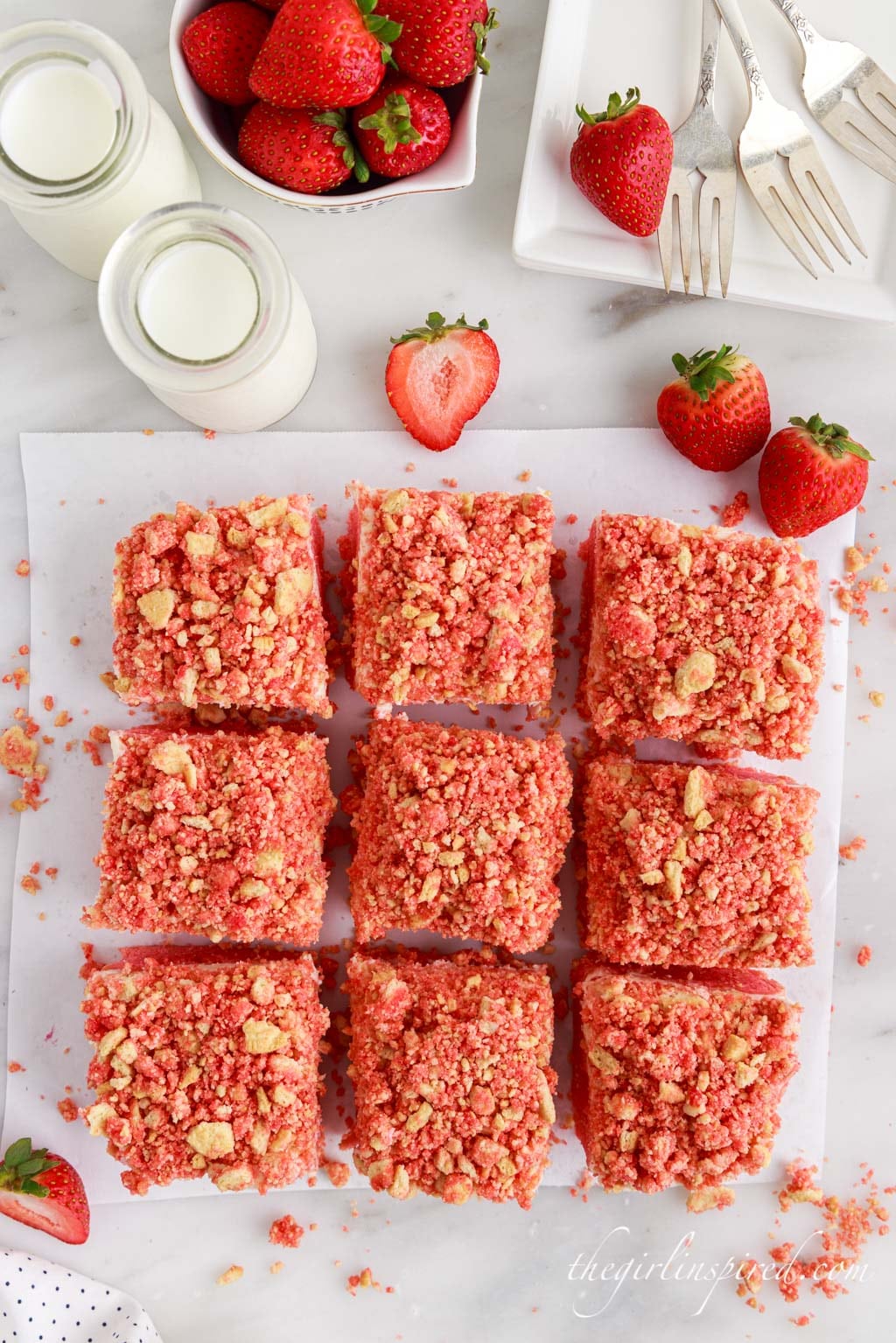 cut up strawberry cheesecake brownie squares