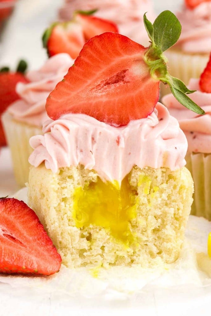bite taken out of strawberry lemon cupcake