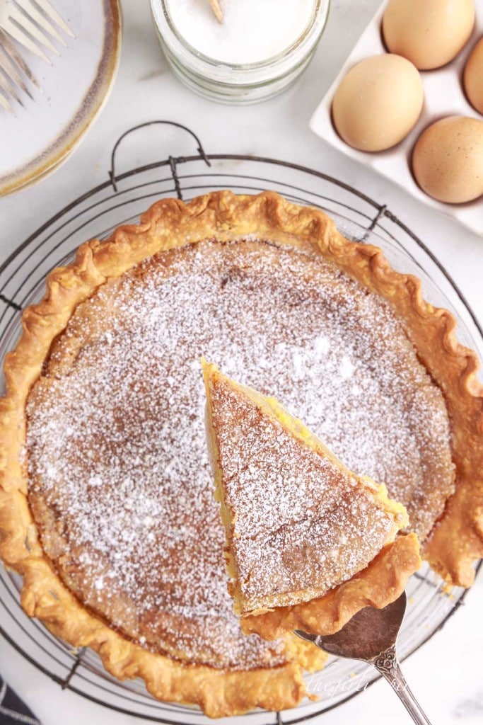 lifting a slice of chess pie from the pie pan