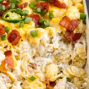 Jalapeno Popper Chicken Casserole with a serving taken out