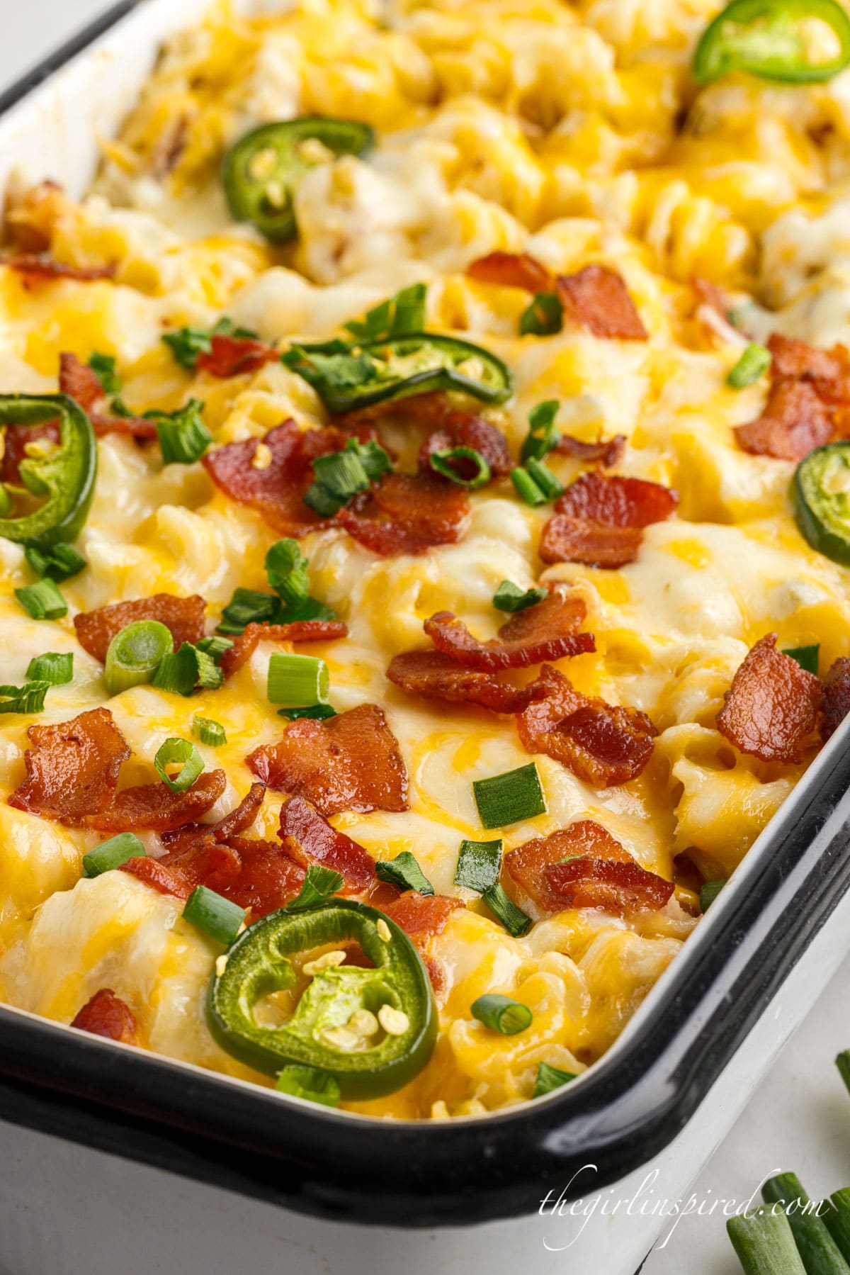 Jalapeno Popper Chicken Casserole in a glass baking dish after cooking