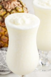 pina colada in a tall glass without garnish