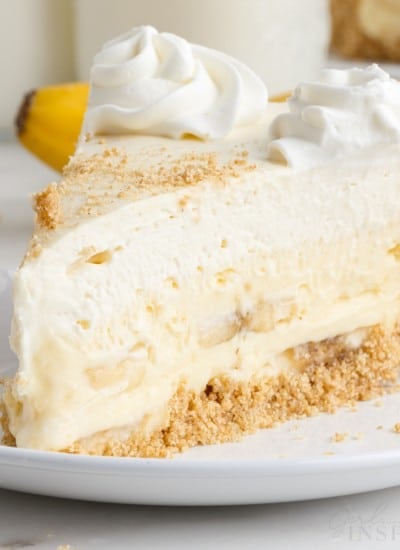 slice of banana cream cheesecake on a plate.