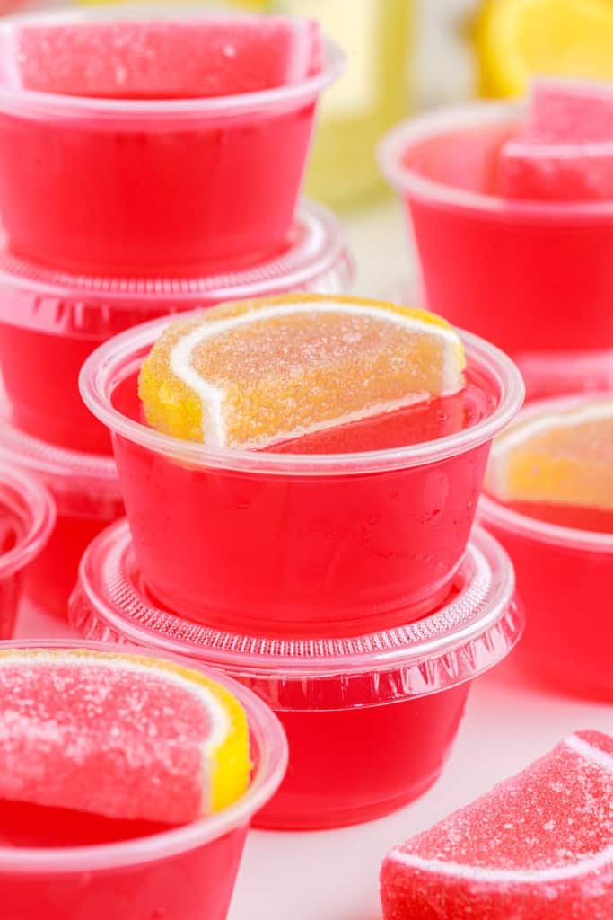 close up of the jello shots some with lids some without