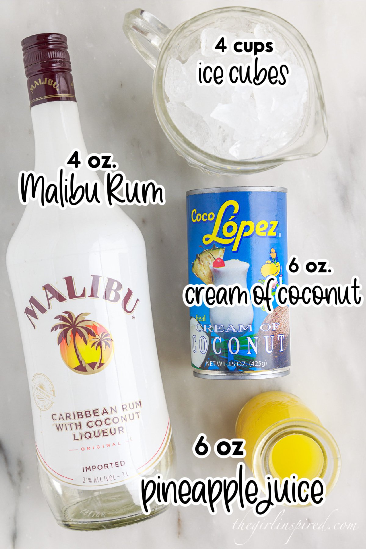Bottle of Malibu rum, can of cream of coconut, measuring cup with ice cubes, bottle of pineapple juice, with text labels of all the piña colada ingredients.