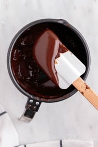 melted chocolate in a double boiler for cupcake frosting