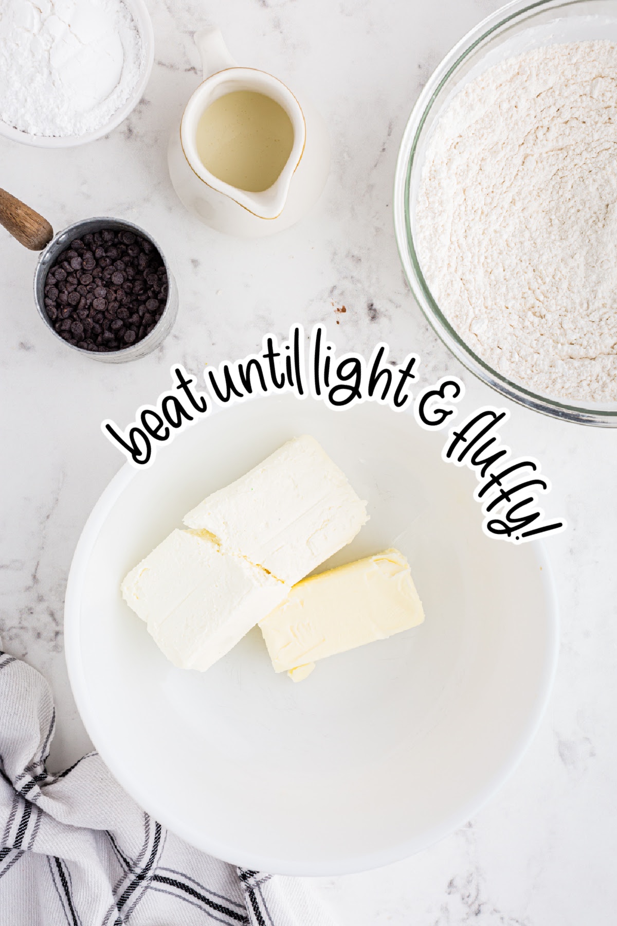 Cream cheese and butter in a mixing bowl with text "beat until light and fluffy."
