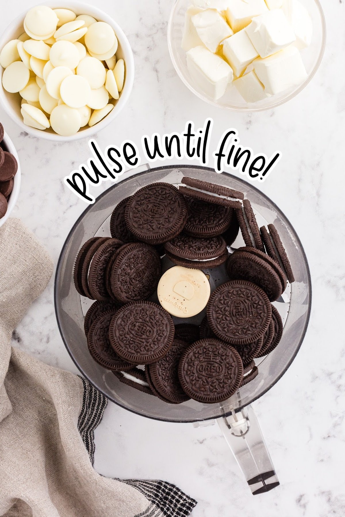 Oreo cookies in the bowl of a food processor with text "pulse until fine!"