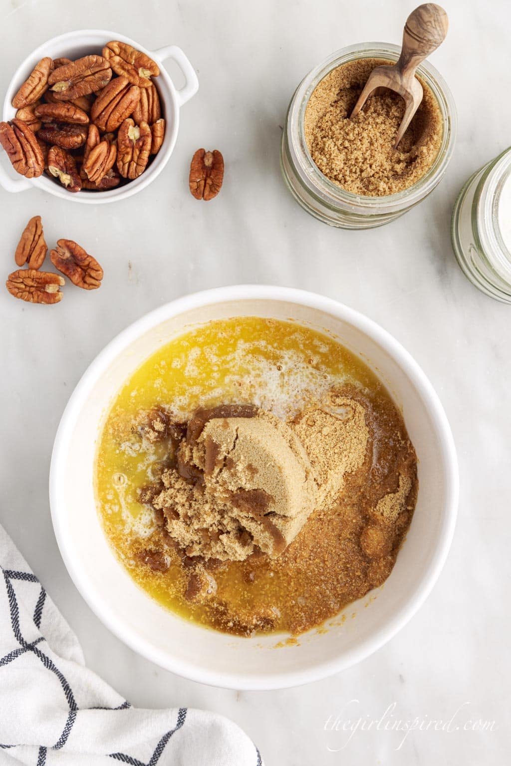 melted butter with brown sugar in a white mixing bowl