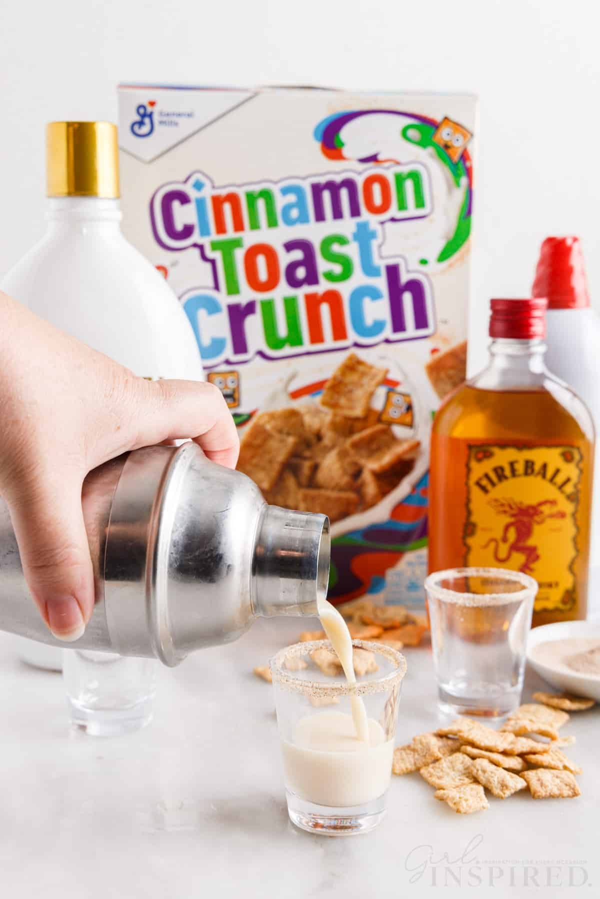 Cinnamon toast crunch shot poured into a shot glass.