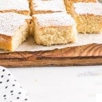 square slices of the hot milk cake recipe set on a cutting board.