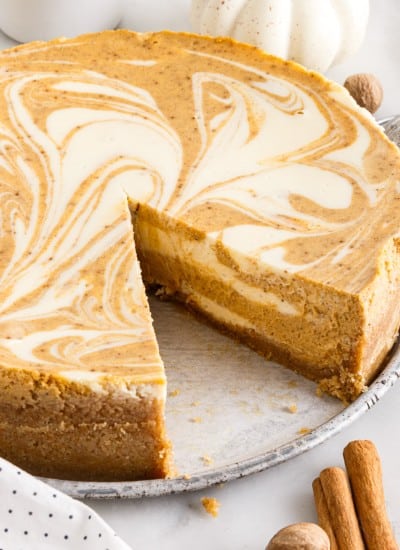 slice missing from pumpkin swirl cheesecake