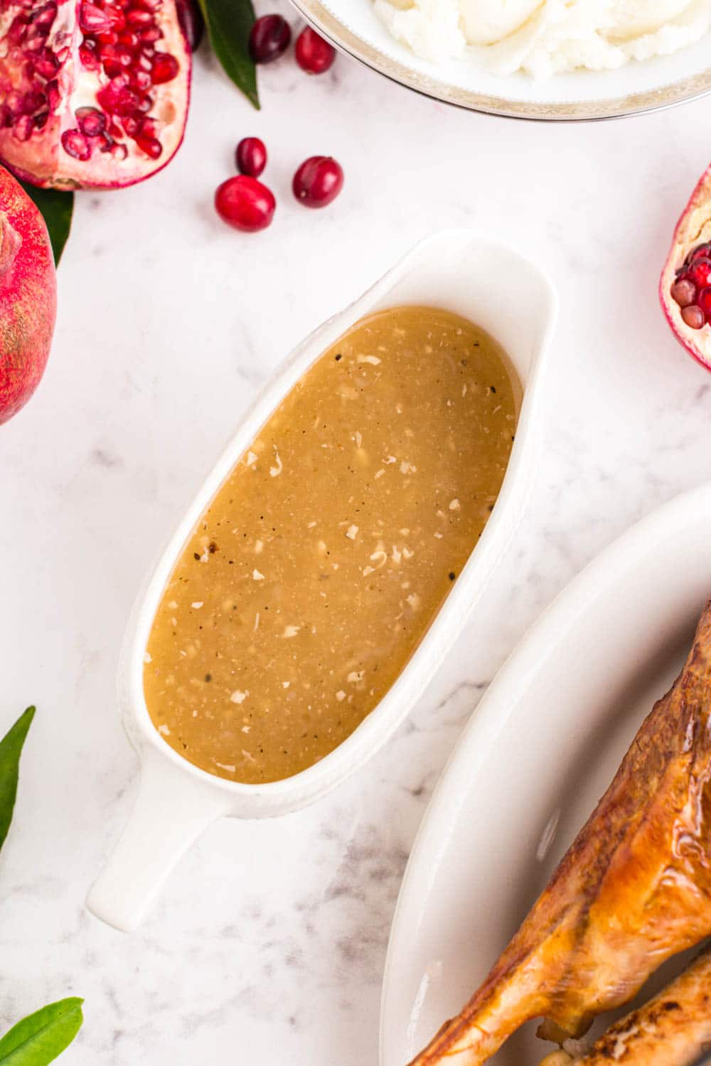 turkey gravy in a white gravy boat