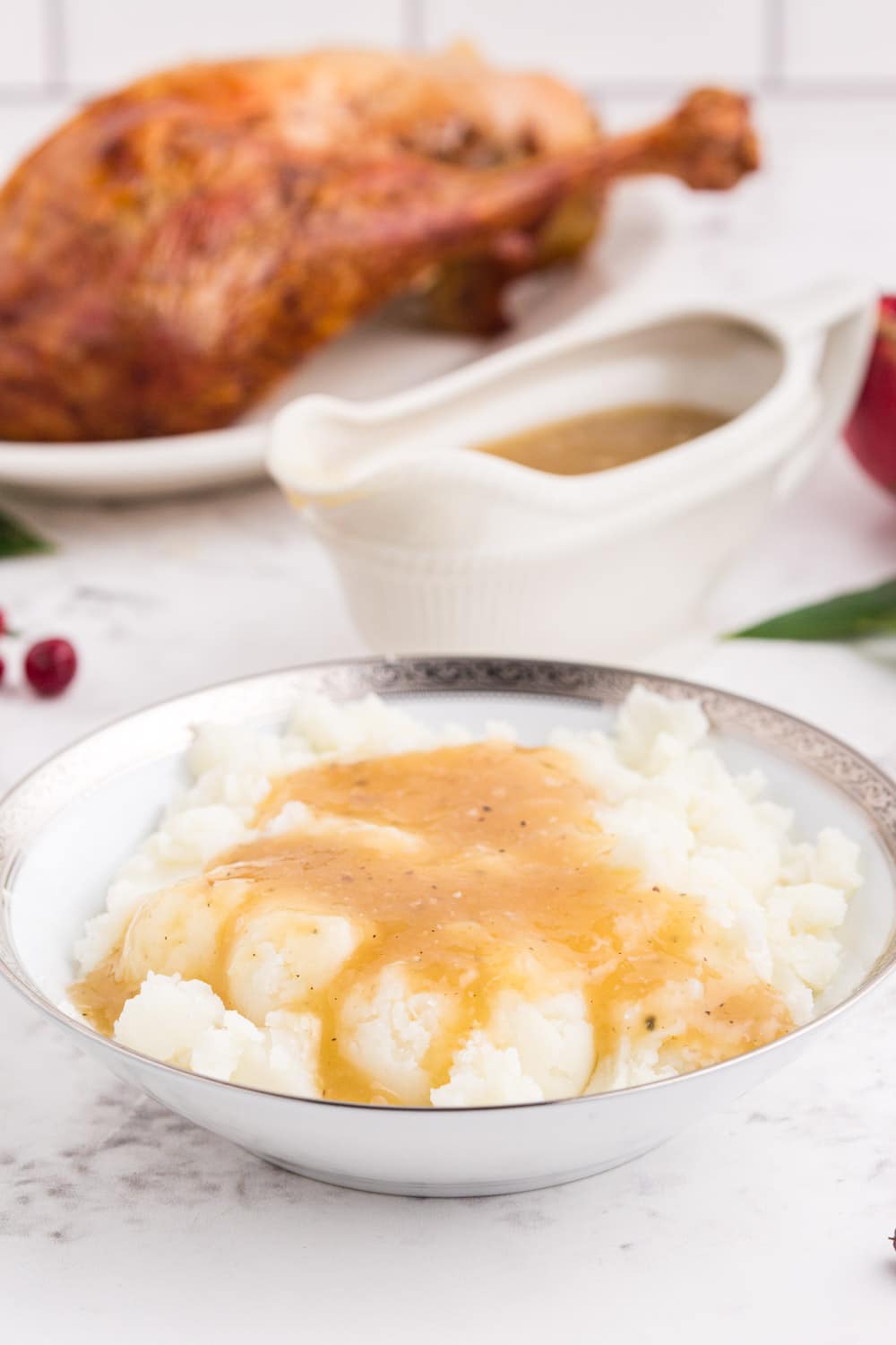 turkey gravy over mashed potatoes in a small dish
