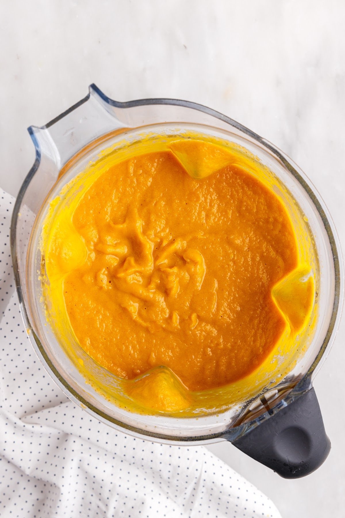 Creamy pumpkin soup in blender.