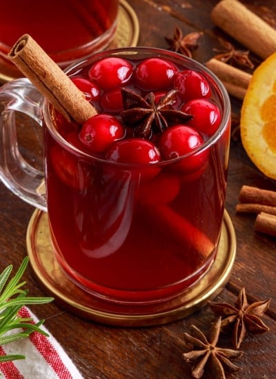 hot cranberry drink in a glass mug