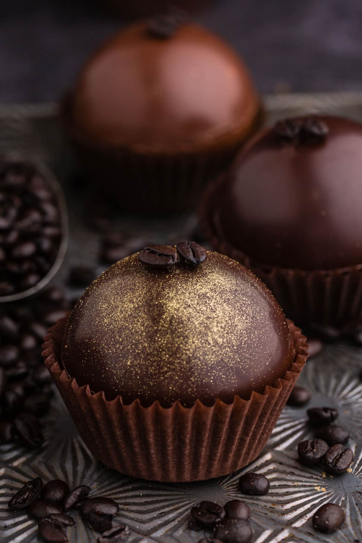 mocha hot chocolate bombs front one dust with edible gold dust