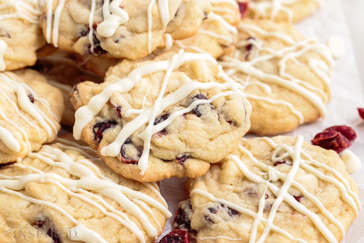 top view of white chocolate cranberry cookies on parchment paper
