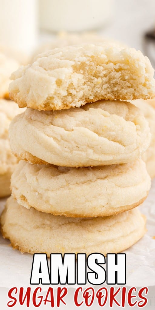 four amish cookies stacked on top of each other with a bite taken from the top cookie